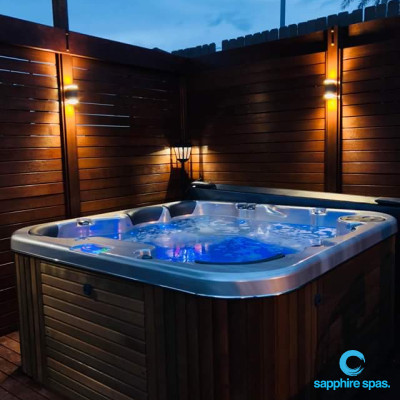 Amazing lighting effect makes this small backyard look amazing!