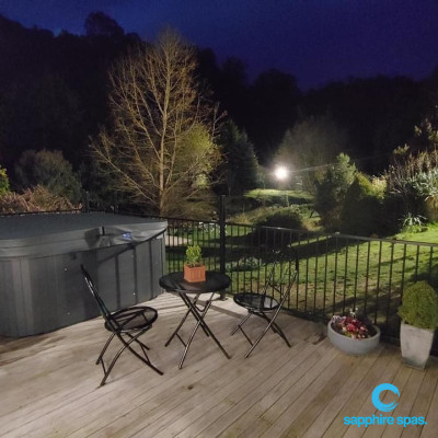 Spa pool ready to use in grey duratek cabinet snuggled up with a slate grey hardcover thanks to the team @ Poolquip Hobart