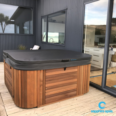 Handcrafted timber cabinet is highlighted by the bold black colorbond cladding thanks to the team @ Spa Pools Otago NZ